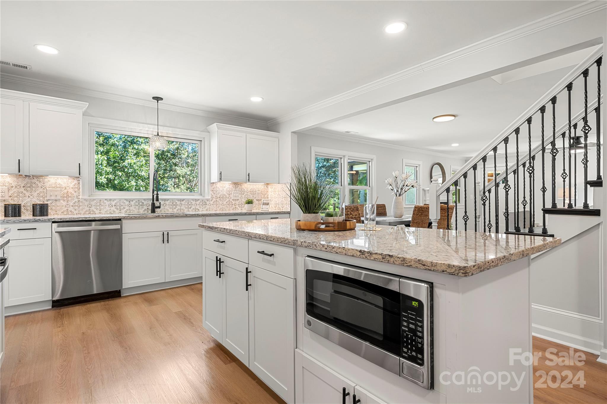 914 Margrace Road Kings Mountain, NC 28086 - Photo 5 of 36 a kitchen with a stove a sink and a microwave