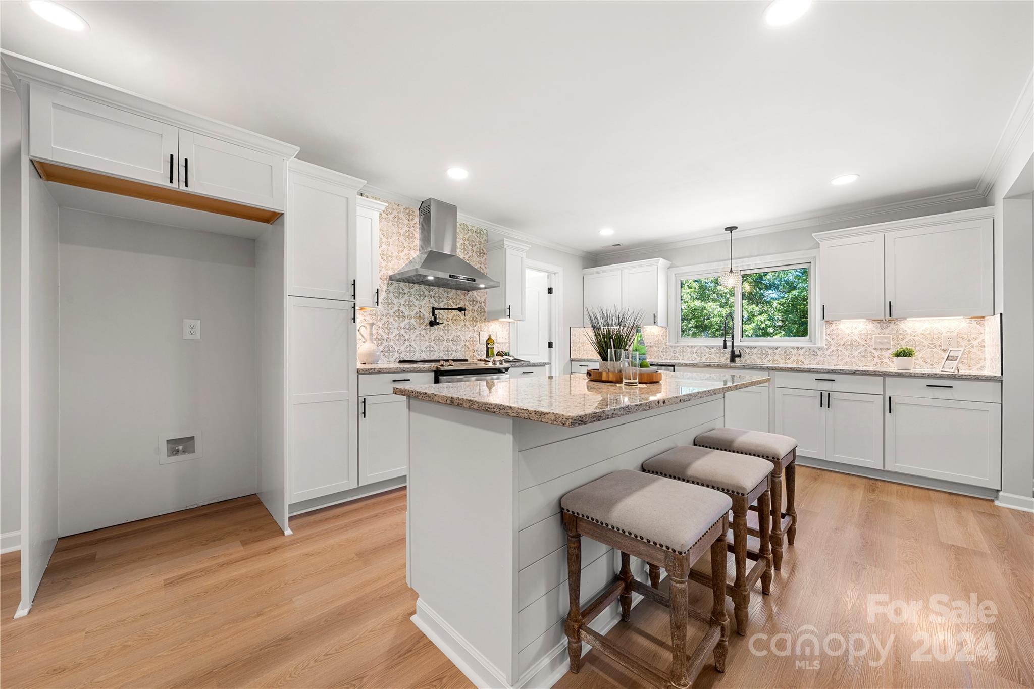 914 Margrace Road Kings Mountain, NC 28086 - Photo 7 of 36 a kitchen with a sink cabinets and wooden floor