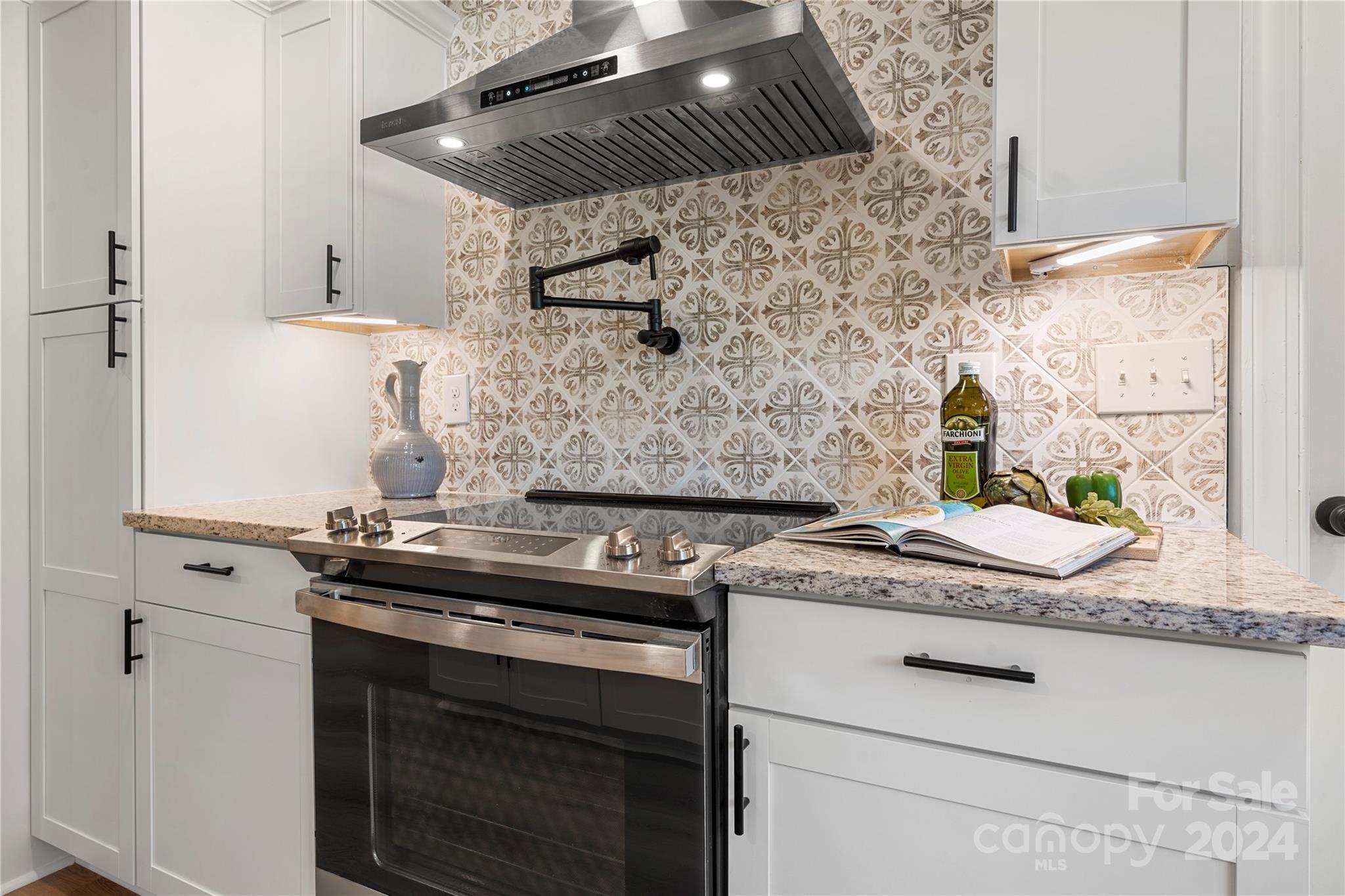 914 Margrace Road Kings Mountain, NC 28086 - Photo 8 of 36 a stove top oven sitting inside of a kitchen