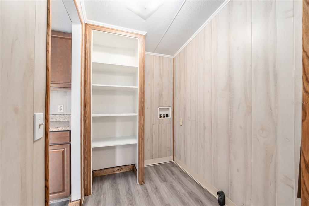 8535 Southwest 155th Street Dunnellon, FL 34432 - Photo 15 of 35 a view of walk in closet with empty racks