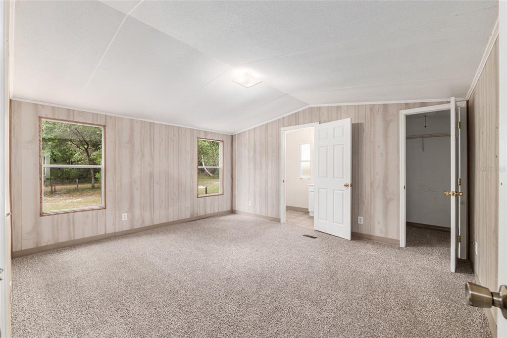 8535 Southwest 155th Street Dunnellon, FL 34432 - Photo 18 of 35 an empty room with windows and closet