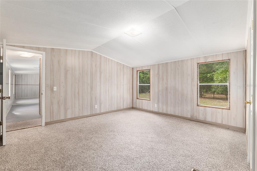 8535 Southwest 155th Street Dunnellon, FL 34432 - Photo 19 of 35 an empty room with windows and closet