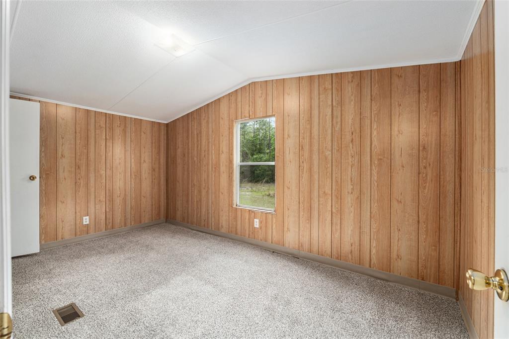 8535 Southwest 155th Street Dunnellon, FL 34432 - Photo 25 of 35 a view of an empty room with a window