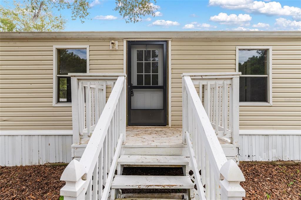 8535 Southwest 155th Street Dunnellon, FL 34432 - Photo 32 of 35 a view of a front door of the house