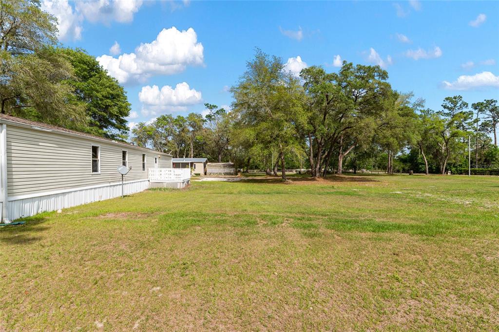 8535 Southwest 155th Street Dunnellon, FL 34432 - Photo 5 of 35 a house view with swimming pool in outdoor space