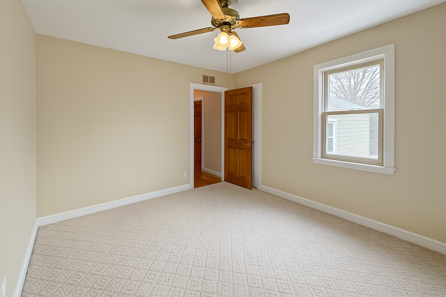 14949 Avers Avenue Midlothian, IL 60445 - Photo 3 of 5 a view of an empty room with a window