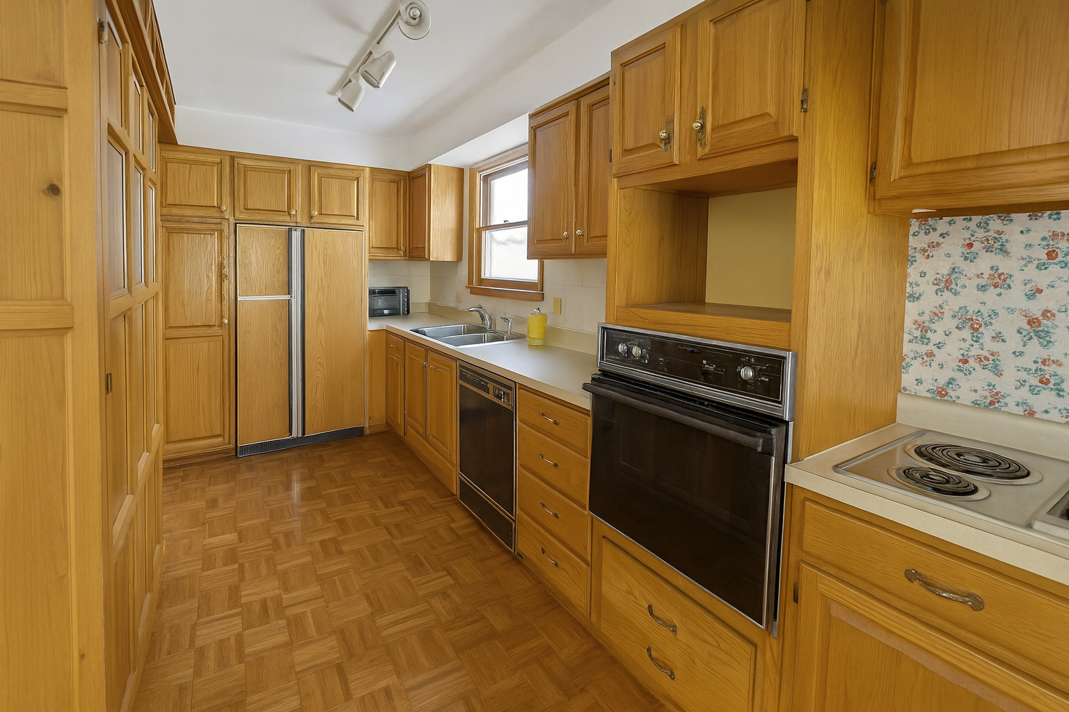 14949 Avers Avenue Midlothian, IL 60445 - Photo 4 of 5 a kitchen with stainless steel appliances a stove a sink and a refrigerator