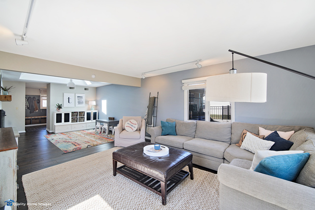 2007 Driving Park Road Wheaton, IL 60187 - Photo 12 of 29 a living room with furniture and wooden floor