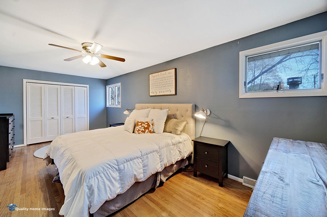 2007 Driving Park Road Wheaton, IL 60187 - Photo 15 of 29 a bedroom with bed and wooden floor