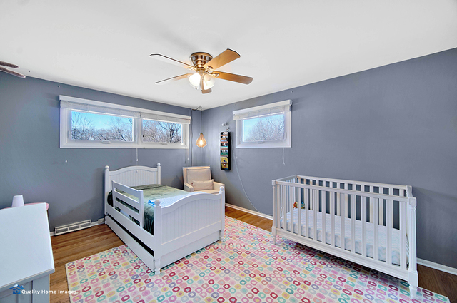 2007 Driving Park Road Wheaton, IL 60187 - Photo 18 of 29 a living room with furniture and a window