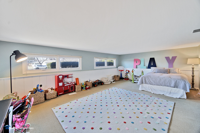 2007 Driving Park Road Wheaton, IL 60187 - Photo 21 of 29 a bedroom with furniture and a baby crib