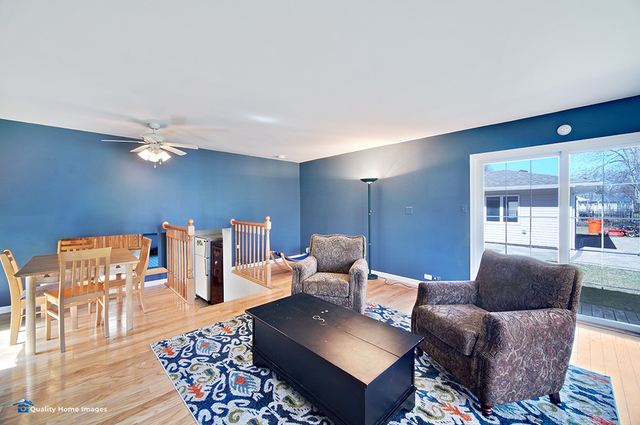 2007 Driving Park Road Wheaton, IL 60187 - Photo 25 of 29 a living room with furniture and wooden floor