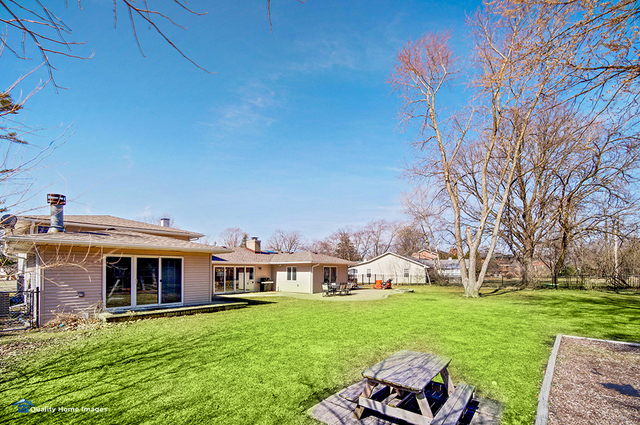 2007 Driving Park Road Wheaton, IL 60187 - Photo 29 of 29 a front view of house with yard and green space