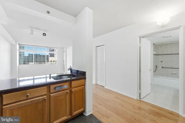 a kitchen with sink and window