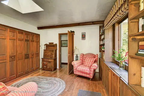 a living room with furniture and a gate