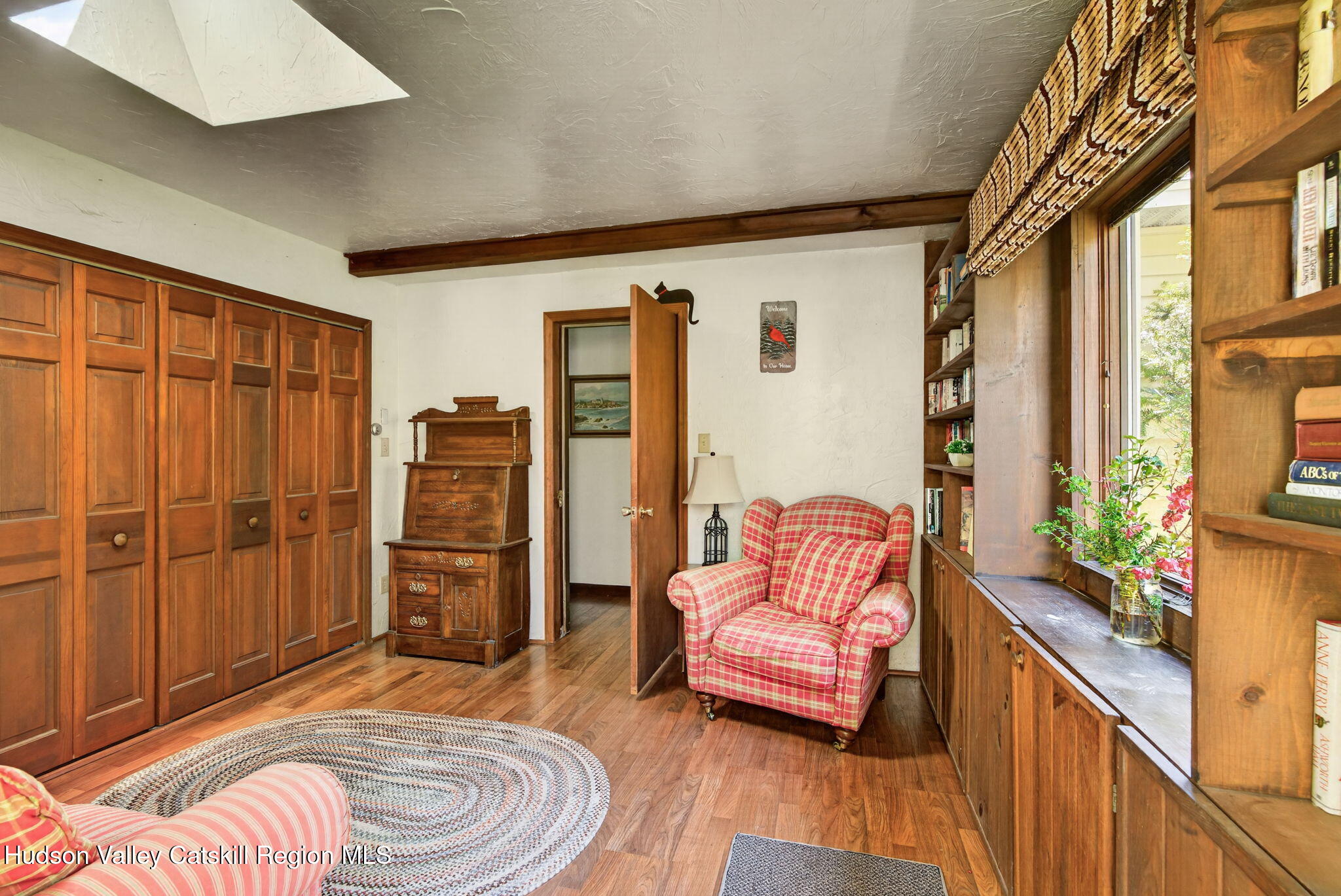 689 Old Road Windham, NY 12496 - Photo 21 of 42 a living room with furniture and a gate