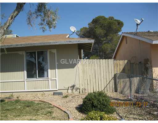 4052 Maple Hill Road Las Vegas, NV 89115 - Photo 4 of 16 Property Photo. FRONT SIDE VIEW