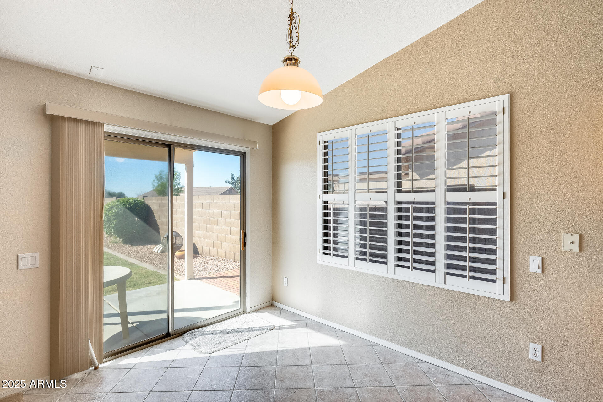 642 South Thunderbird Drive Apache Junction, AZ 85120 - Photo 17 of 53 a view of an empty room with a window