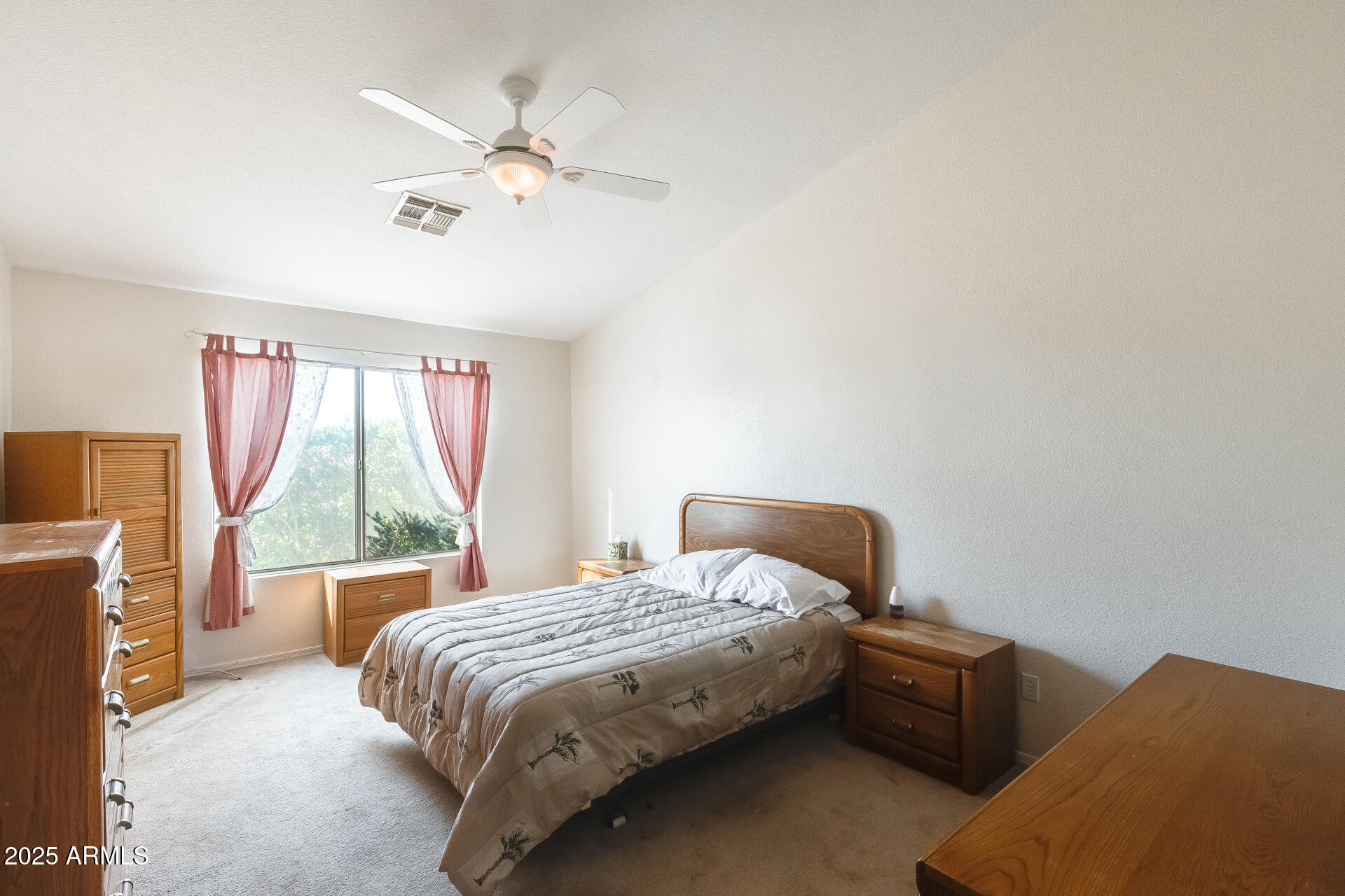 642 South Thunderbird Drive Apache Junction, AZ 85120 - Photo 21 of 53 a bedroom with a bed and a large window with outer view