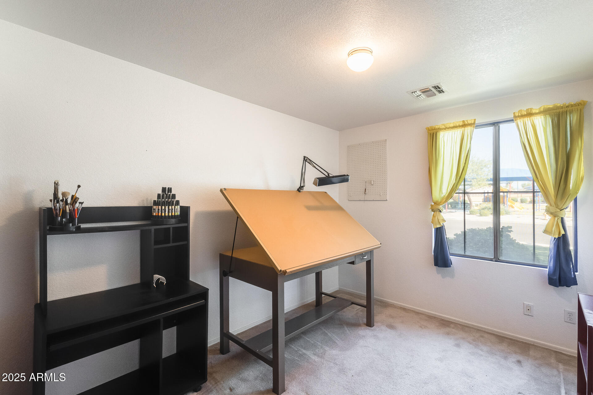 642 South Thunderbird Drive Apache Junction, AZ 85120 - Photo 28 of 53 a room with furniture and window