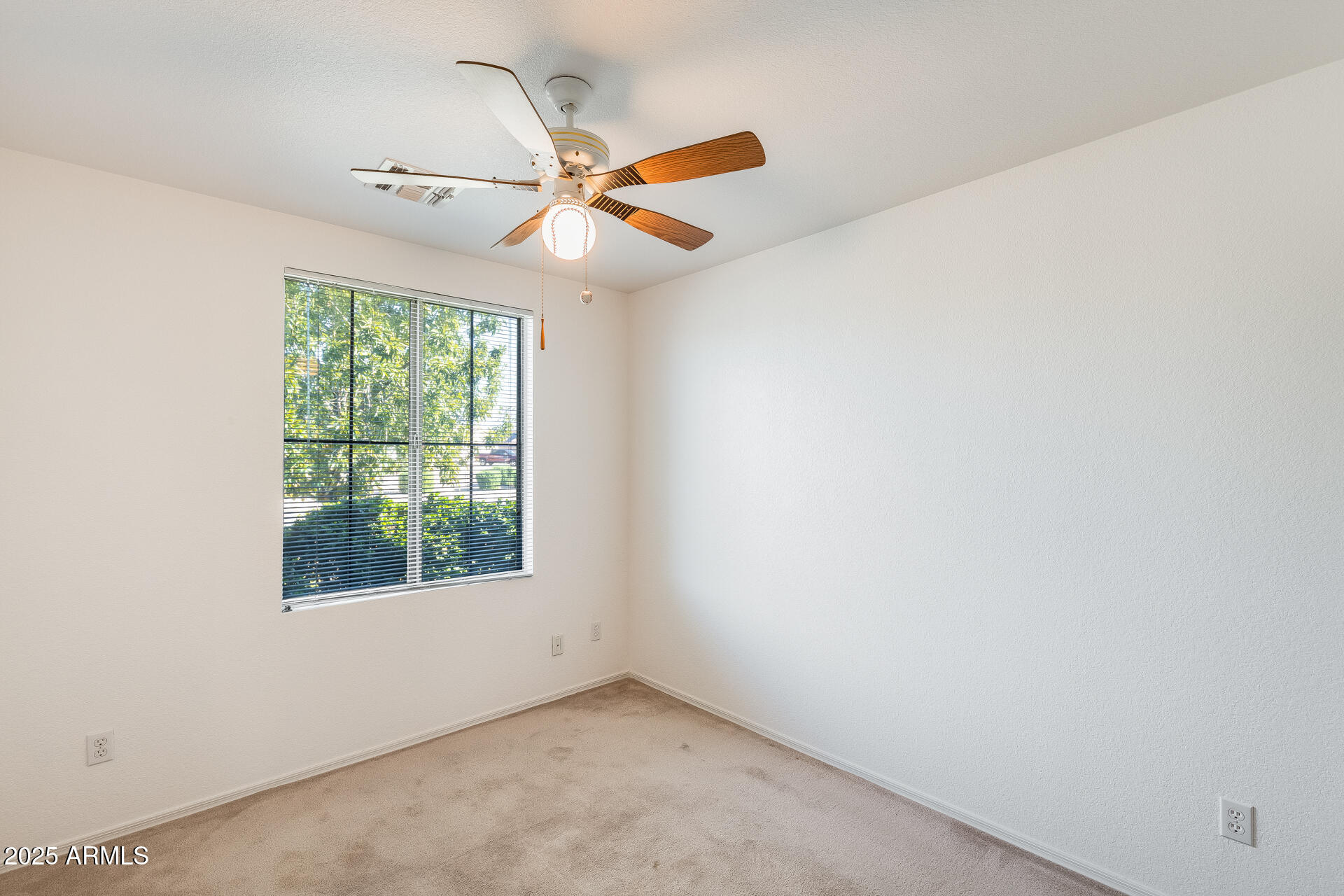 642 South Thunderbird Drive Apache Junction, AZ 85120 - Photo 30 of 53 an empty room with windows and fan