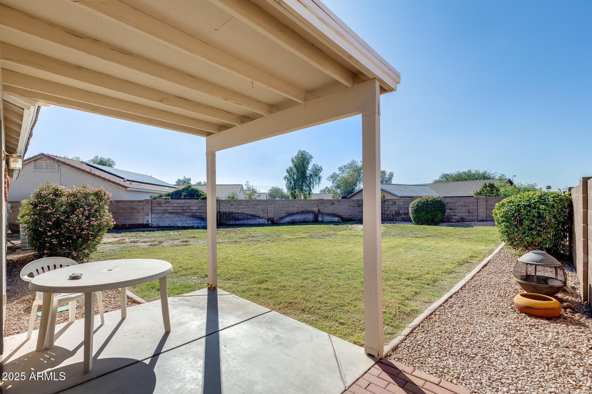 642 South Thunderbird Drive Apache Junction, AZ 85120 - Photo 36 of 53 a view of a backyard with table and chairs potted plants with outer view