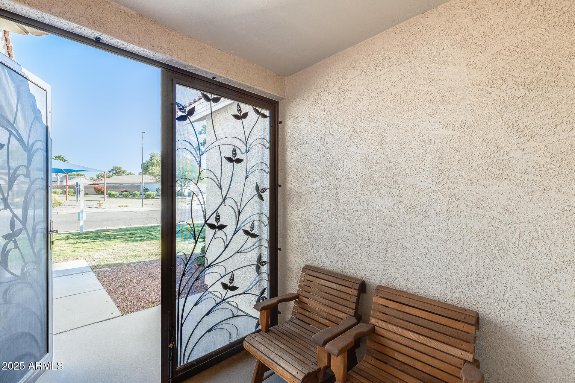 642 South Thunderbird Drive Apache Junction, AZ 85120 - Photo 5 of 53 a view of wooden floor with a glass door