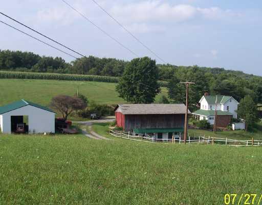 147 Community Center Road Harmony, PA 16037 - Photo 2 of 8 Other. Photo of home, pole building and bank barn from the corner of the driveway.