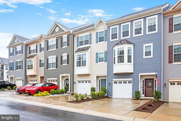 a front view of multi story residential apartment building