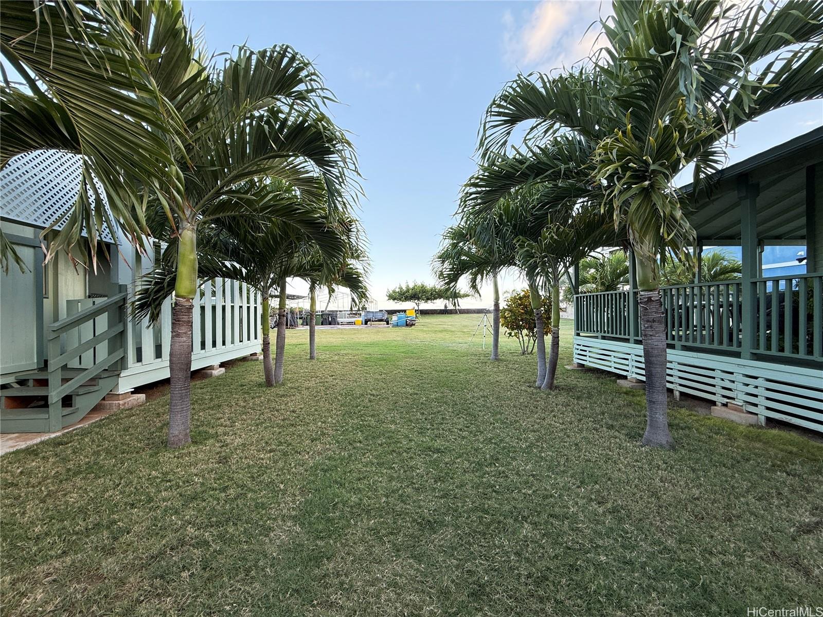 91-249 Ewa Beach Road Ewa Beach, HI 96706 - Photo 21 of 24 a view of backyard with green space
