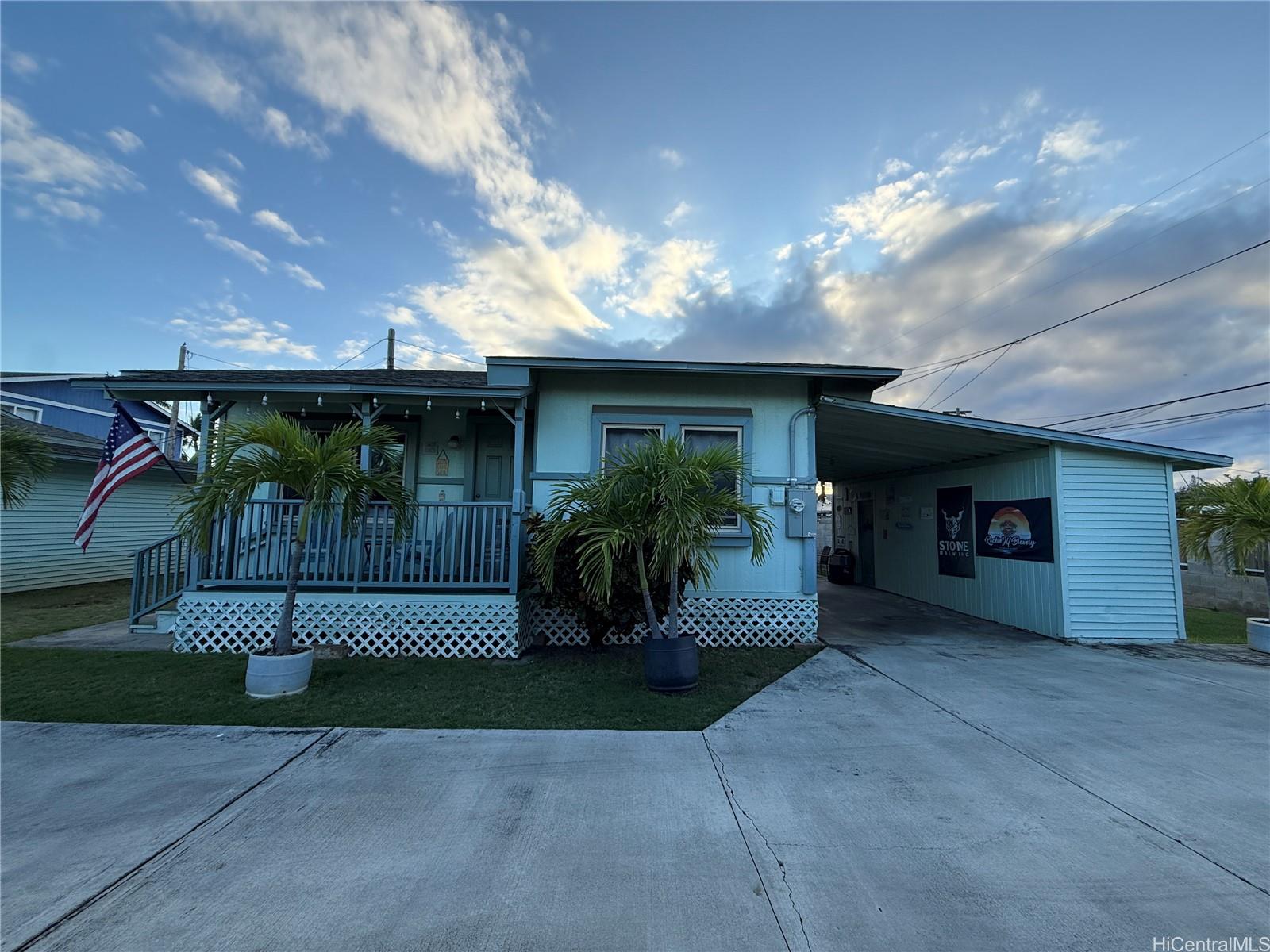 91-249 Ewa Beach Road Ewa Beach, HI 96706 - Photo 9 of 24 a view of a house with barbeque and outdoor space