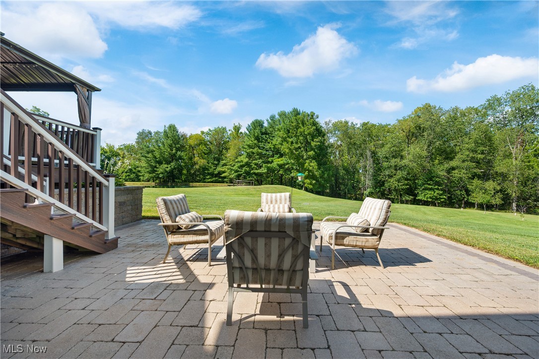 10229 Crawford Road Homerville, OH 44235 - Photo 28 of 42 View of patio featuring stairs