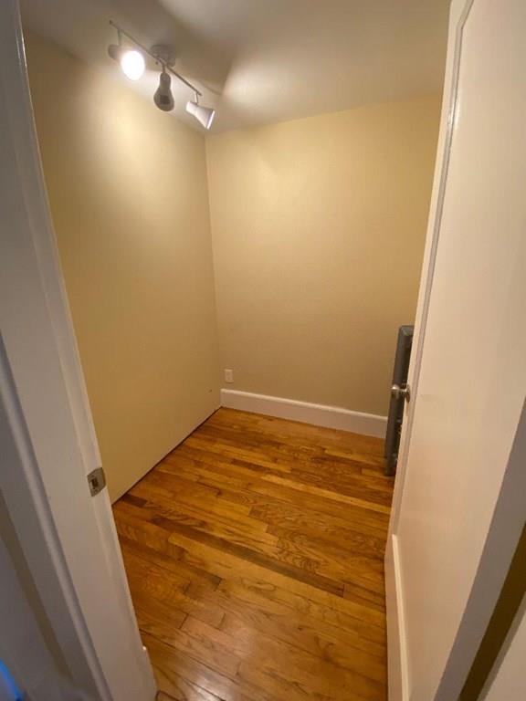 64 Chilson Street Springfield, MA 01118 - Photo 17 of 36 a view of empty room with wooden floor