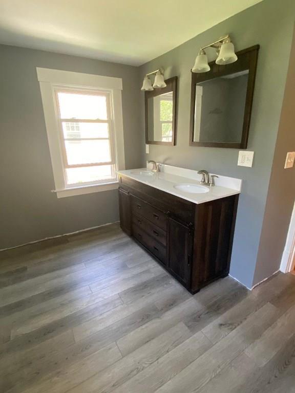 64 Chilson Street Springfield, MA 01118 - Photo 18 of 36 a bathroom with a sink and mirror