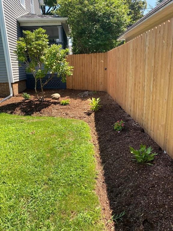 64 Chilson Street Springfield, MA 01118 - Photo 30 of 36 a backyard of a house with lots of green space