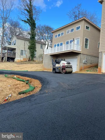 a view of a back yard of the house
