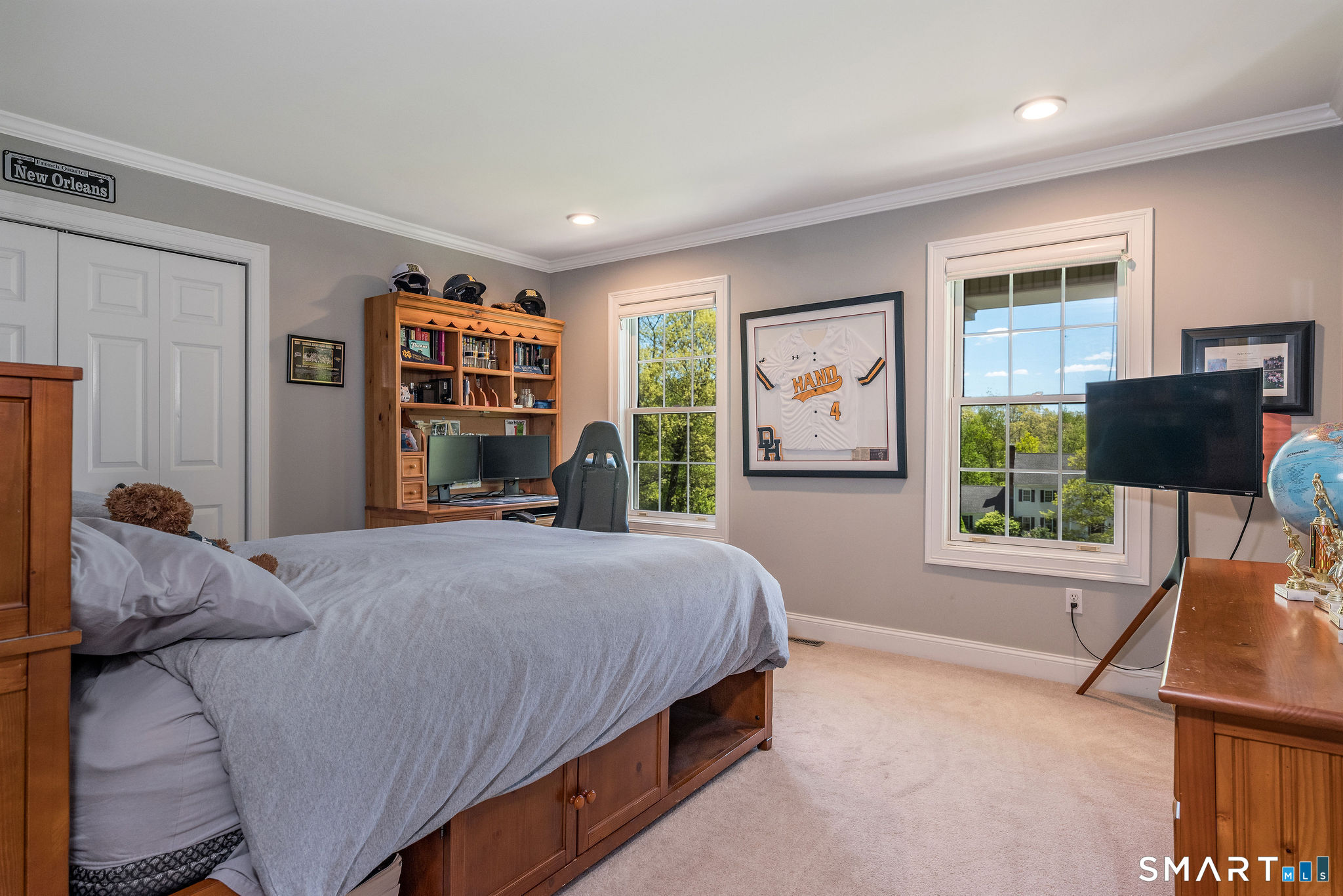 170 Devonshire Lane Madison, CT 06443 - Photo 26 of 39 a bedroom with a bed and glass window