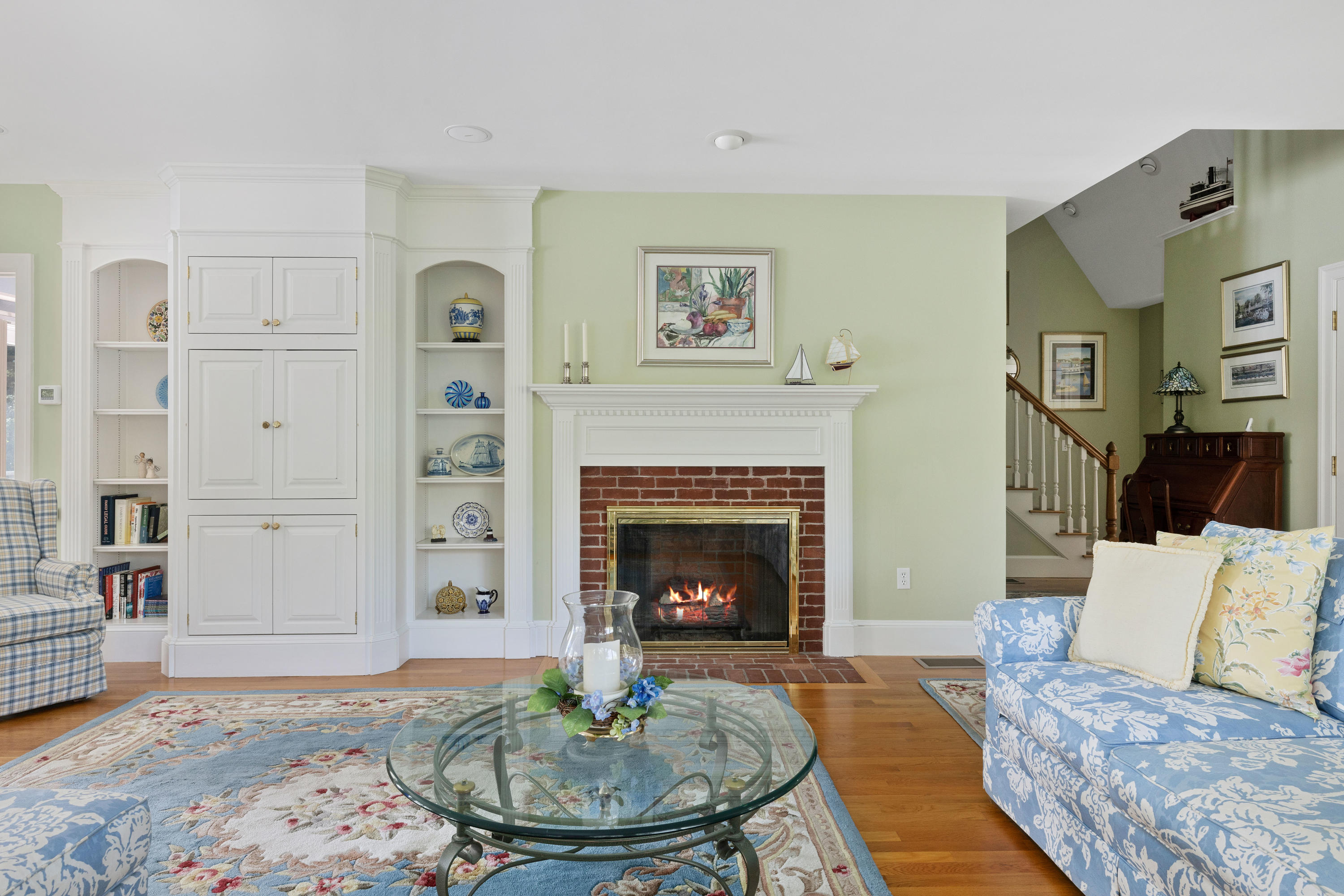 316 Wheeler Road Marstons Mills, MA 02648 - Photo 12 of 50 a living room with furniture and a fireplace