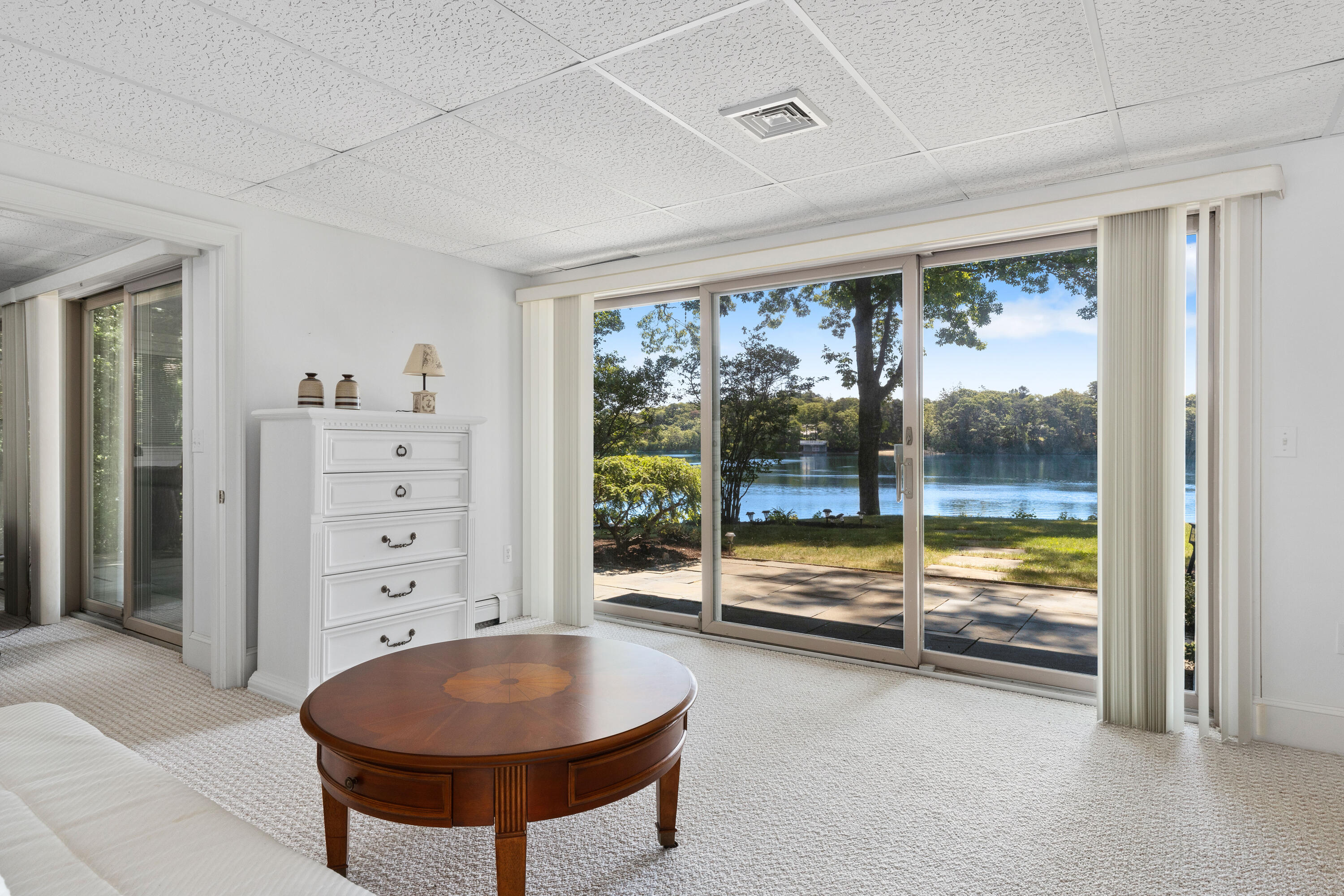 316 Wheeler Road Marstons Mills, MA 02648 - Photo 25 of 50 a room with window and a table