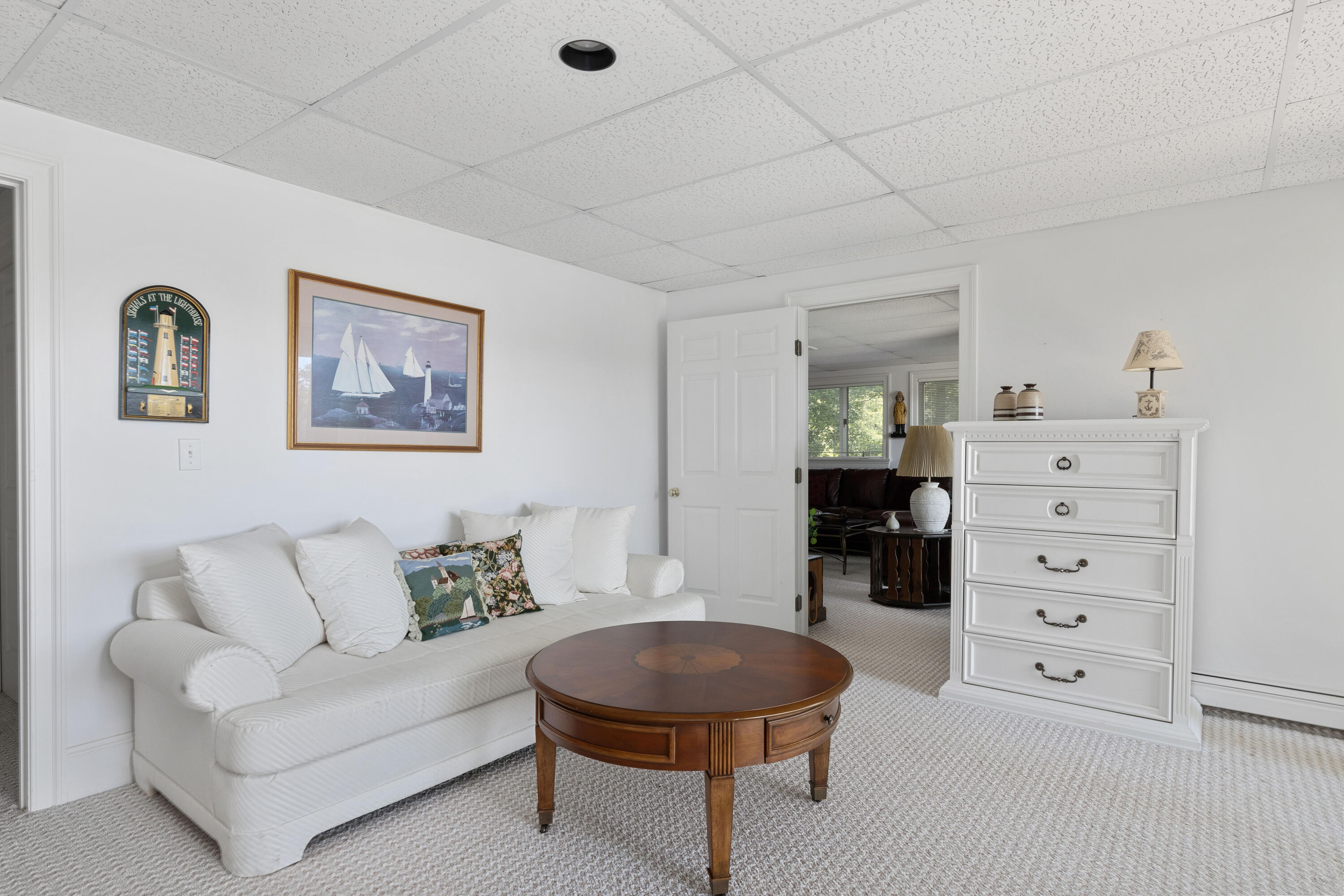 316 Wheeler Road Marstons Mills, MA 02648 - Photo 26 of 50 a living room with furniture and a lamp