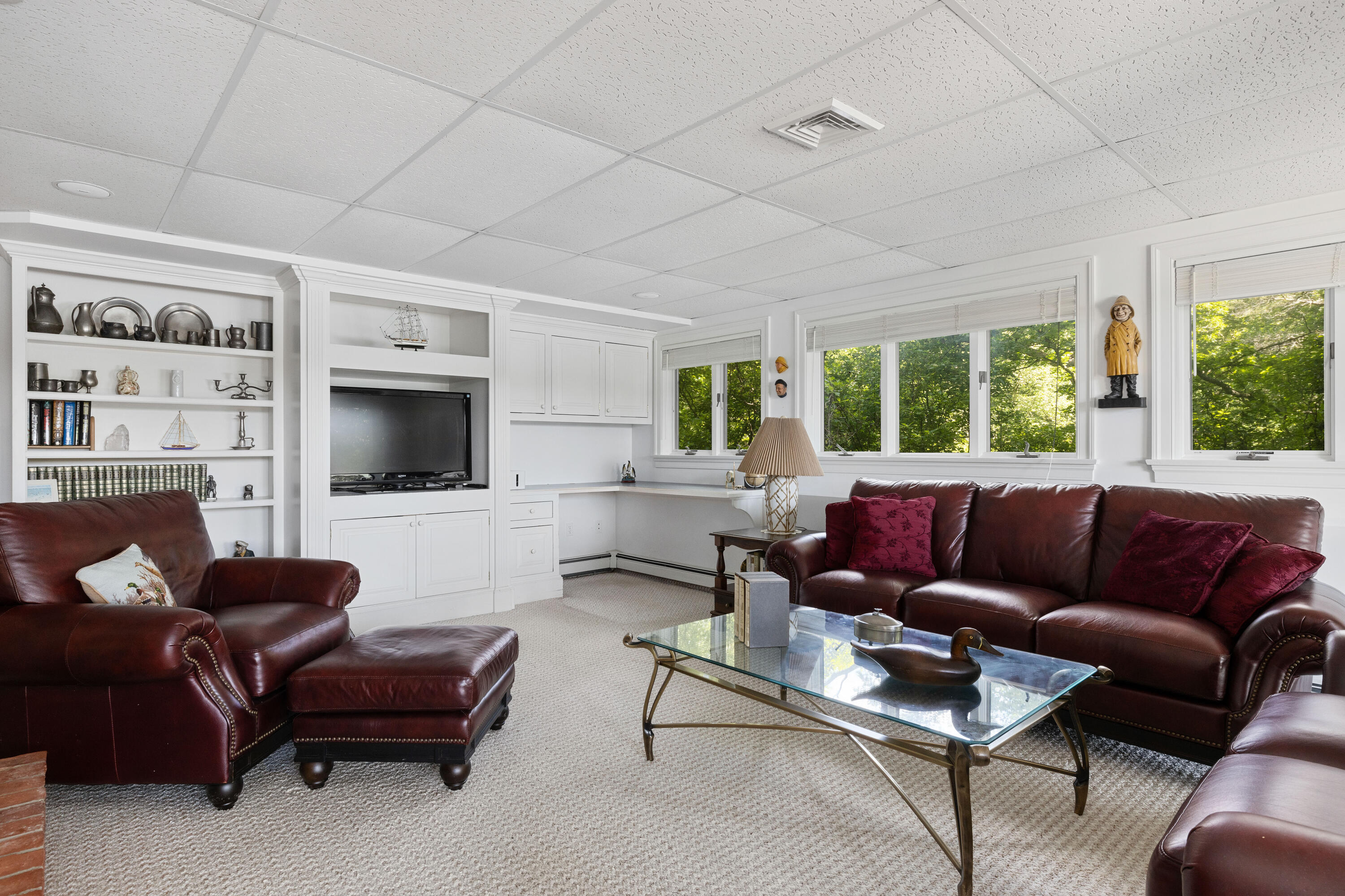 316 Wheeler Road Marstons Mills, MA 02648 - Photo 28 of 50 a living room with furniture and a flat screen tv