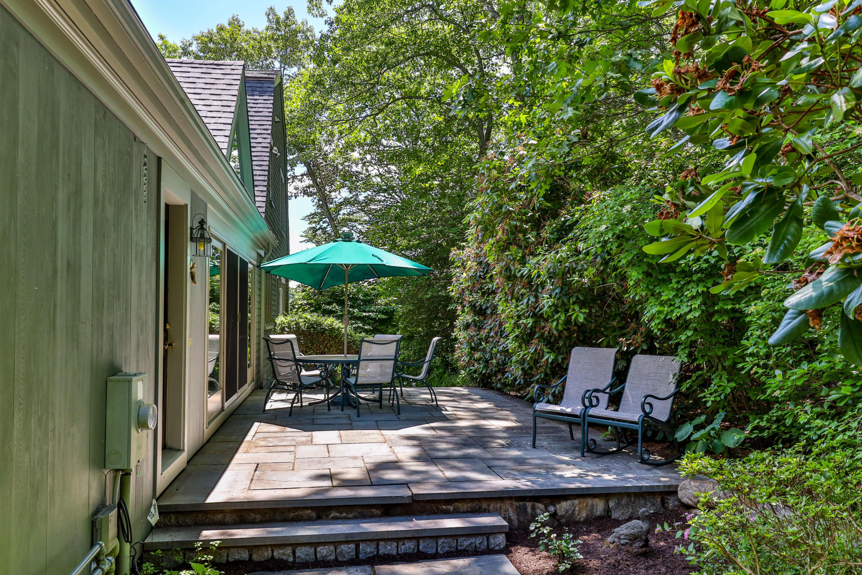 316 Wheeler Road Marstons Mills, MA 02648 - Photo 32 of 50 a view of outdoor sitting area with furniture