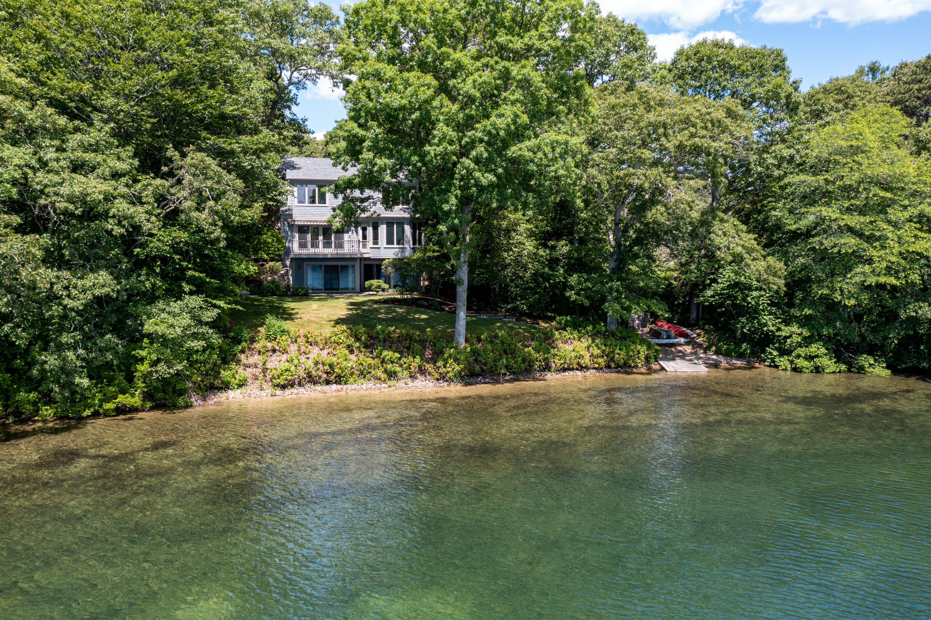 316 Wheeler Road Marstons Mills, MA 02648 - Photo 44 of 50 a view of a house with a street