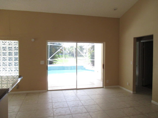 12084 Rockwell Way Boca Raton, FL 33428 - Photo 9 of 25 a view of an empty room and window