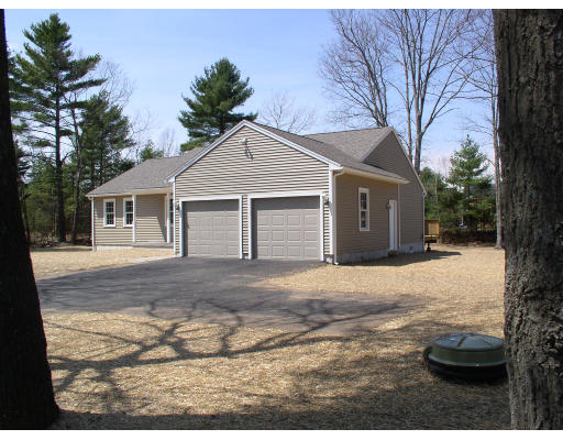 Lot 3 Barre Road Hardwick, MA 01082 - Photo 4 of 7 a front view of a house with a yard covered in snow