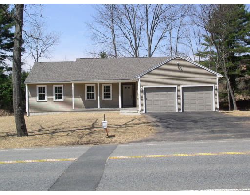 Lot 3 Barre Road Hardwick, MA 01082 - Photo 5 of 7 a front view of a house with a garden and yard