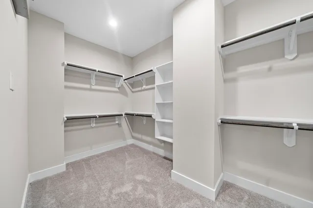 a view of an empty walk in closet