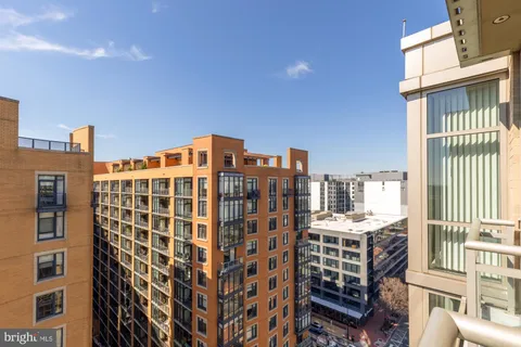 a view of a building with glass windows