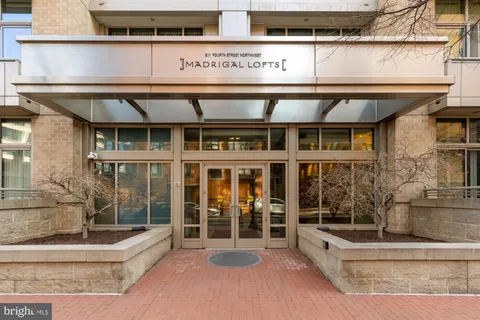 a front view of a building with glass windows