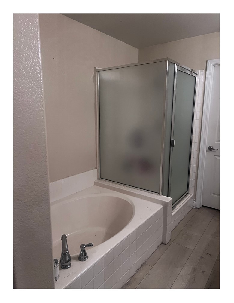 8692 East 9th Street, Unit 29 Rancho Cucamonga, CA 91730 - Photo 11 of 15 a bathroom with a bathtub